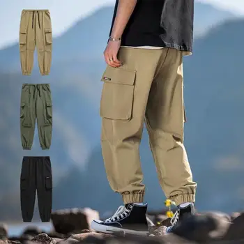 Мъжки панталони-карго плътен цвят еластична талия-големи джобове дантела свободни вързани на глезените Джоггингов панталони за работа, уличен стил